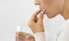Girls take medicine